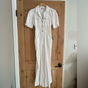 Red Carter 
Size small 
White jumpsuit with open back